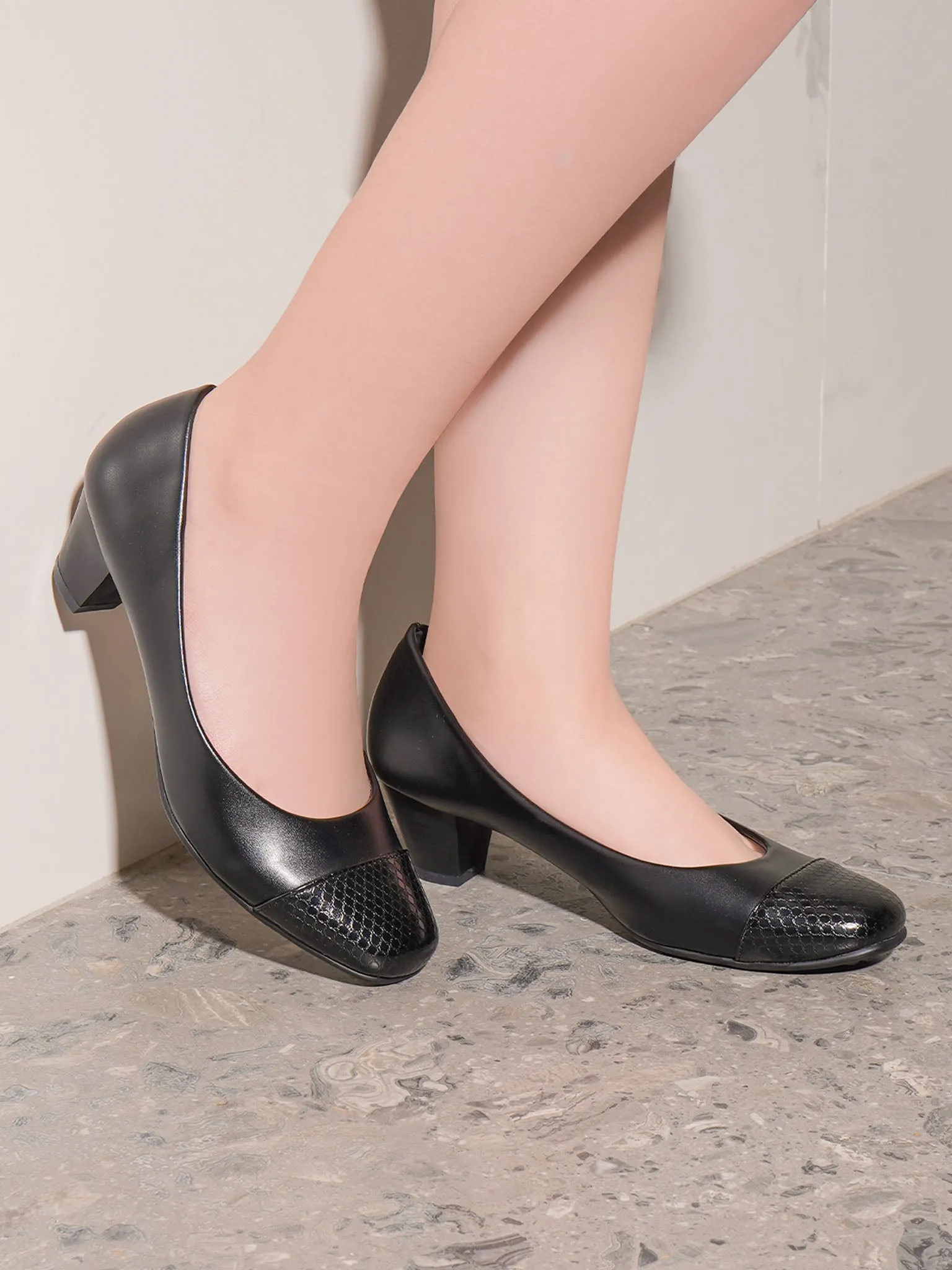 Neil Heel Pumps